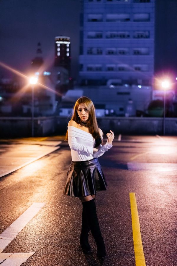 [Taiwanese sister] Dora Zhou Yingxin Street style boots black silk leather skirt